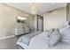 Comfortable bedroom with luxury bedding, wall-mounted TV, and stylish decor for a serene retreat at 7180 E Kierland Blvd # 1218, Scottsdale, AZ 85254