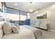 Stylish bedroom with city views, modern dresser, and TV for ultimate comfort and entertainment at 7180 E Kierland Blvd # 1218, Scottsdale, AZ 85254