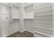 Spacious walk-in closet with ample shelving and rod space for storage at 7180 E Kierland Blvd # 1218, Scottsdale, AZ 85254
