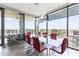 Bright dining room features a glass table, comfortable seating, and expansive views of the city skyline at 7180 E Kierland Blvd # 1218, Scottsdale, AZ 85254