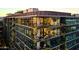 Modern building exterior featuring private balconies, large windows, and verdant plant accents at 7180 E Kierland Blvd # 1218, Scottsdale, AZ 85254