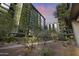 Contemporary building exterior with lush landscaping, providing a tranquil and verdant aesthetic at 7180 E Kierland Blvd # 1218, Scottsdale, AZ 85254