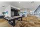 A game room with pool table, bar seating, and projector for movie nights at 7180 E Kierland Blvd # 1218, Scottsdale, AZ 85254