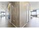 Bright hallway features modern lighting, neutral walls, and access to rooms with city views at 7180 E Kierland Blvd # 1218, Scottsdale, AZ 85254