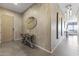 Hallway with unique wood decor, stylish wall art, and modern lighting fixtures at 7180 E Kierland Blvd # 1218, Scottsdale, AZ 85254