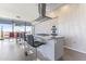 Kitchen island with granite countertops, seating, and stainless steel appliances offers an elegant space at 7180 E Kierland Blvd # 1218, Scottsdale, AZ 85254