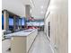 Sleek, modern kitchen with stainless steel appliances, granite countertops, and a spacious island at 7180 E Kierland Blvd # 1218, Scottsdale, AZ 85254