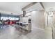 Open-concept kitchen featuring a large island with seating and stainless steel appliances at 7180 E Kierland Blvd # 1218, Scottsdale, AZ 85254