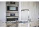 Gourmet kitchen sink with granite countertop and built-in oven at 7180 E Kierland Blvd # 1218, Scottsdale, AZ 85254