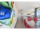 Open concept living space with stylish kitchen, dining area, and art at 7180 E Kierland Blvd # 1218, Scottsdale, AZ 85254