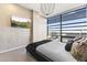 Beautiful main bedroom with elegant lighting, floor-to-ceiling windows and a stunning desert view at 7180 E Kierland Blvd # 1218, Scottsdale, AZ 85254