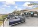 Inviting outdoor lounge with comfortable seating, a fire pit, TVs, and grills for social gatherings at 7180 E Kierland Blvd # 1218, Scottsdale, AZ 85254