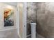 Modern powder room with a unique vessel sink and sleek, stylish finishes at 7180 E Kierland Blvd # 1218, Scottsdale, AZ 85254