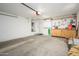 Spacious garage with ample storage space and a pegboard organizer at 8331 E Plata Ave, Mesa, AZ 85212
