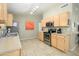 Efficient kitchen featuring stainless steel appliances, offering a functional and stylish cooking space at 8331 E Plata Ave, Mesa, AZ 85212