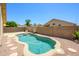 Backyard pool with surrounding gravel and flagstone at 8331 E Plata Ave, Mesa, AZ 85212
