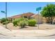 Corner lot home with mature landscaping and manicured yard at 8331 E Plata Ave, Mesa, AZ 85212