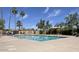Community pool with ample seating areas and lush landscaping, great for relaxation at 856 E Village Cir S Dr, Phoenix, AZ 85022
