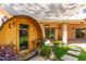 Backyard barrel sauna surrounded by lush greenery and stone pathway at 8845 E Larkspur Dr, Scottsdale, AZ 85260