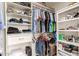 Organized walk-in closet featuring shelving, hanging rods, and ample storage solutions at 8845 E Larkspur Dr, Scottsdale, AZ 85260