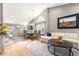 Bright living room featuring vaulted ceilings and modern décor and finishes at 8845 E Larkspur Dr, Scottsdale, AZ 85260