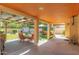 Outdoor patio area with shaded seating, barrel sauna, and landscaped garden at 8845 E Larkspur Dr, Scottsdale, AZ 85260