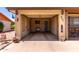 View of an attached single car garage that includes unique geometric design at 962 S Main Dr, Apache Junction, AZ 85120