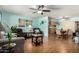 Spacious living area with hardwood floors, soft blue walls, and an open floor plan at 962 S Main Dr, Apache Junction, AZ 85120
