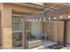 Cozy outdoor patio area with comfortable seating and a fountain at 11983 W Fillmore St, Avondale, AZ 85323