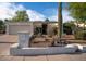 Charming single-story home featuring desert landscaping, a two-car garage, and an appealing front entrance at 1302 E Nicolet Ave, Phoenix, AZ 85020