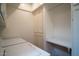 Practical laundry room with washer, dryer, built-in cabinets, and utility sink for efficient chores at 1302 E Nicolet Ave, Phoenix, AZ 85020