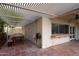 Spacious outdoor patio with a dining table and convenient pass-through window to the home at 1302 E Nicolet Ave, Phoenix, AZ 85020