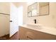 Bright bathroom featuring a sleek vanity, vessel sink, and modern black hardware at 1546 W Culver St, Phoenix, AZ 85007