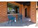 Inviting porch with seating, perfect for relaxing and enjoying the neighborhood views at 1546 W Culver St, Phoenix, AZ 85007