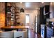 Bright kitchen with stainless steel appliances and breakfast bar at 1546 W Culver St, Phoenix, AZ 85007