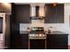 Bright kitchen with stainless steel appliances, and gas range at 1546 W Culver St, Phoenix, AZ 85007