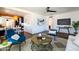 Open-concept living space with views to the dining area, stylish furniture, and ample natural light at 1546 W Culver St, Phoenix, AZ 85007