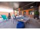 Cozy patio with multiple seating areas, planters, and a covered roof at 1546 W Culver St, Phoenix, AZ 85007