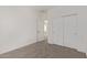 Bedroom featuring carpet flooring and a closet with sliding doors at 1564 N Pueblo Dr, Apache Junction, AZ 85120