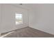 Bedroom with carpet flooring, a window with mountain views, and neutral walls at 1564 N Pueblo Dr, Apache Junction, AZ 85120