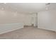 Spacious, carpeted room with recessed lighting, perfect for a living space or entertainment area at 1564 N Pueblo Dr, Apache Junction, AZ 85120