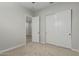 Bedroom featuring an ensuite bathroom and closet at 18025 N 65Th Pl, Phoenix, AZ 85054