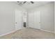 Bedroom featuring an ensuite bathroom and closet at 18025 N 65Th Pl, Phoenix, AZ 85054