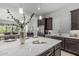 Stylish kitchen island overlooks the dining and living areas, perfect for entertaining guests at 18025 N 65Th Pl, Phoenix, AZ 85054