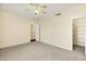 Spacious bedroom features a ceiling fan and carpet flooring at 1975 E Chilton Dr, Tempe, AZ 85283