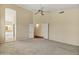Bedroom boasts high ceilings and neutral colors with an open closet at 1975 E Chilton Dr, Tempe, AZ 85283