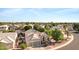A charming two-story home with a three car garage and a well-manicured front yard at 1975 E Chilton Dr, Tempe, AZ 85283