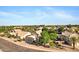 A charming two-story home with a three car garage and a well-manicured front yard at 1975 E Chilton Dr, Tempe, AZ 85283