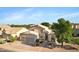 A charming two-story home with a three car garage and a well-manicured front yard at 1975 E Chilton Dr, Tempe, AZ 85283