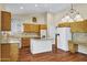 Spacious kitchen with an island, lots of cabinets, and modern appliances at 1975 E Chilton Dr, Tempe, AZ 85283